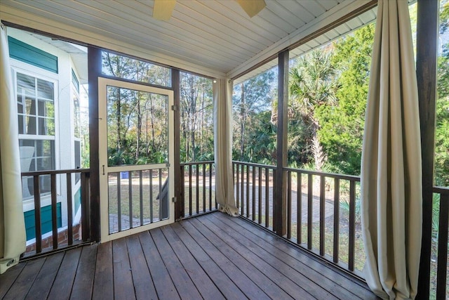 unfurnished sunroom featuring a wealth of natural light