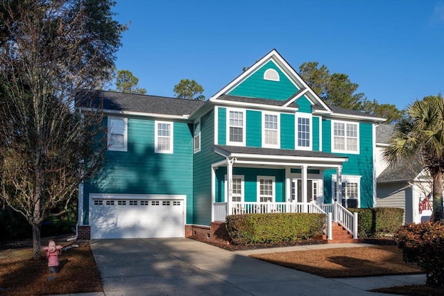 view of front of house with a garage and covered porch