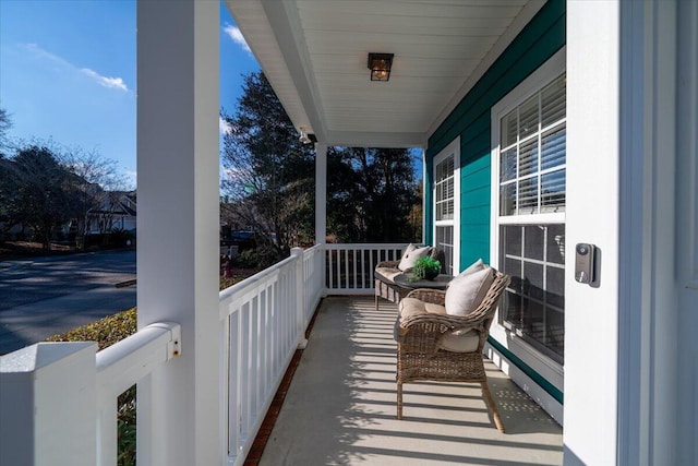 balcony featuring a porch