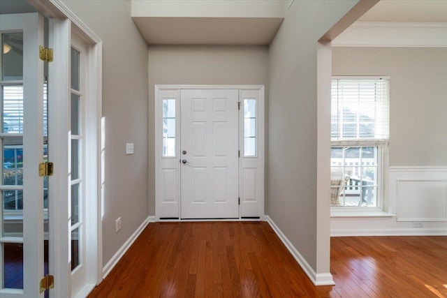 foyer with dark hardwood / wood-style flooring