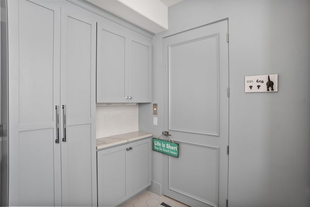 interior space featuring white cabinetry