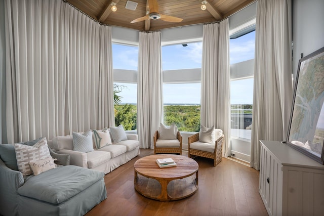 sunroom with wood ceiling and ceiling fan