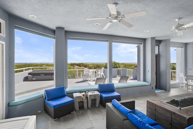 view of patio / terrace featuring outdoor lounge area and ceiling fan