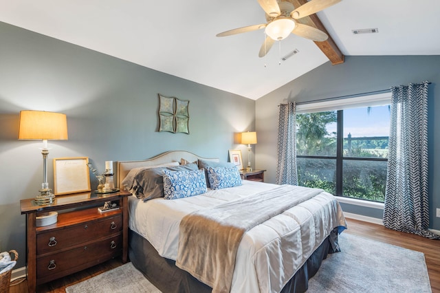 bedroom with lofted ceiling with beams, wood-type flooring, and ceiling fan