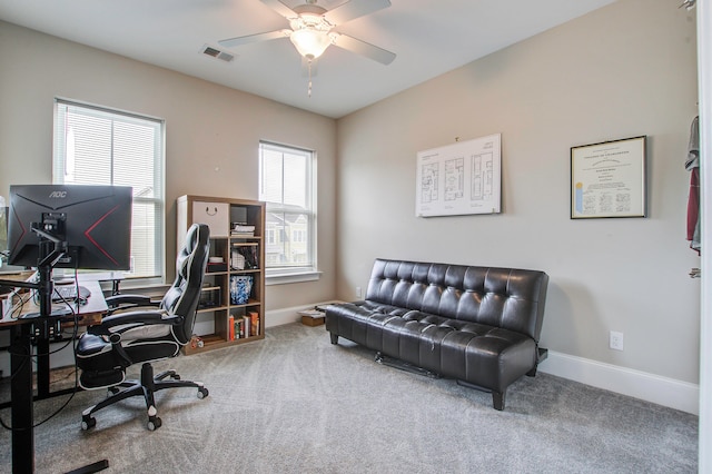 office with ceiling fan and carpet