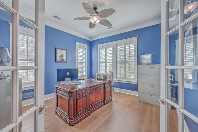 office space featuring ornamental molding, light wood-type flooring, and french doors