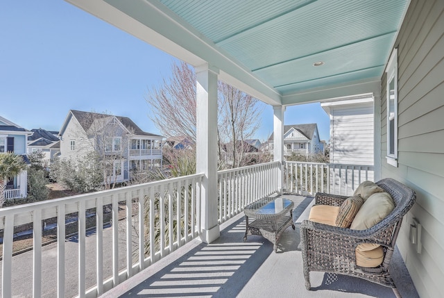 balcony featuring a residential view