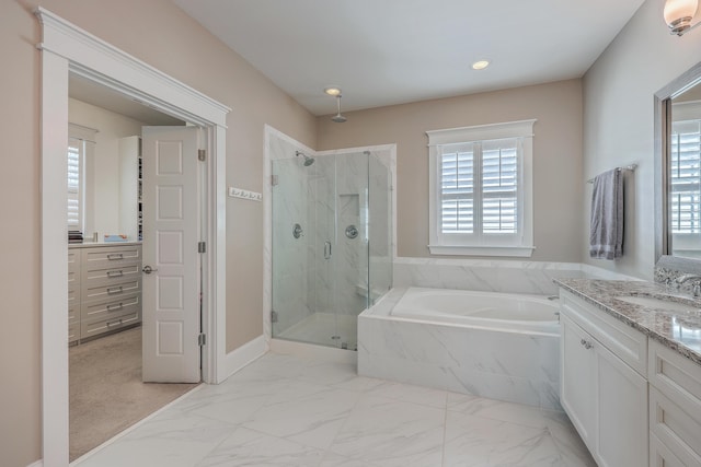 full bathroom featuring a marble finish shower, marble finish floor, vanity, a bath, and recessed lighting