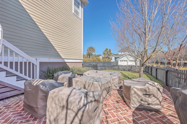 view of patio / terrace with a fenced backyard and area for grilling