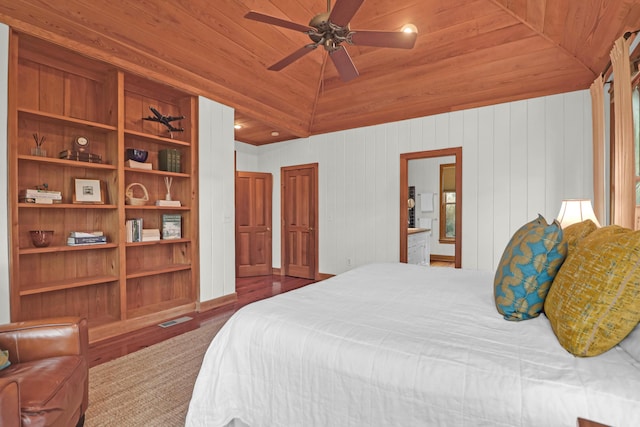 bedroom featuring lofted ceiling, wood ceiling, and visible vents