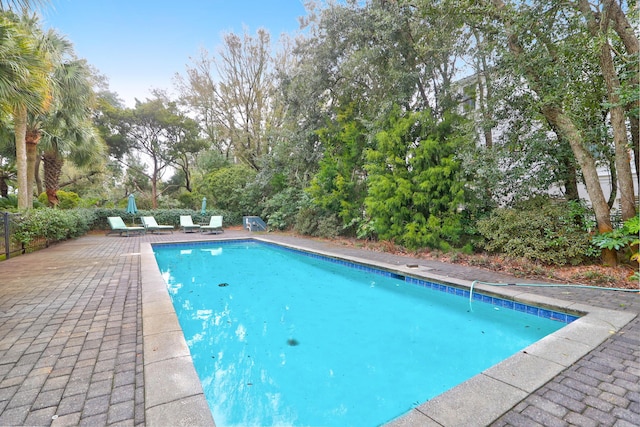 pool featuring a patio area