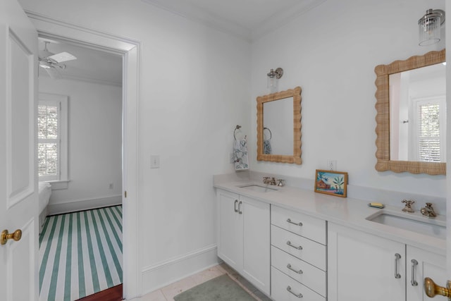 bathroom with ornamental molding, tile patterned flooring, vanity, and ceiling fan