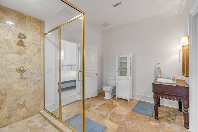 ensuite bathroom featuring stone finish flooring, crown molding, a stall shower, toilet, and visible vents