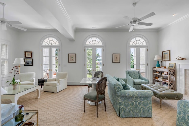 living room featuring light colored carpet, ceiling fan, french doors, and crown molding