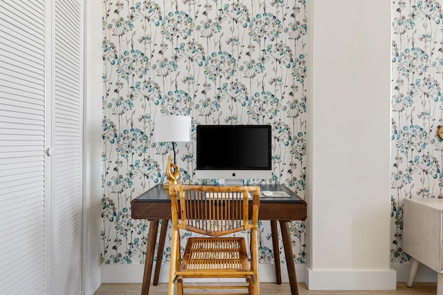 14 Lockwood Dr Unit 1C, Charleston, SC 29401 - home office with baseboards, wallpapered walls, and wood finished floors
