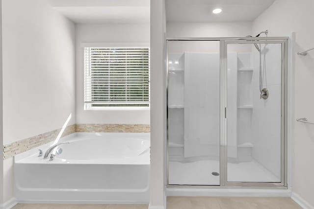 bathroom with independent shower and bath