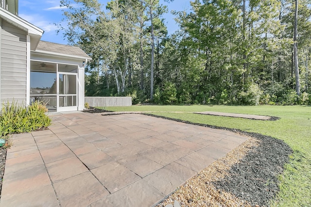 view of patio / terrace with a sunroom