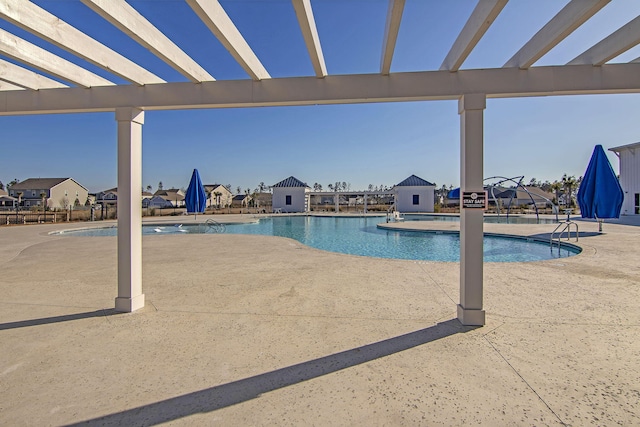 view of pool with a patio