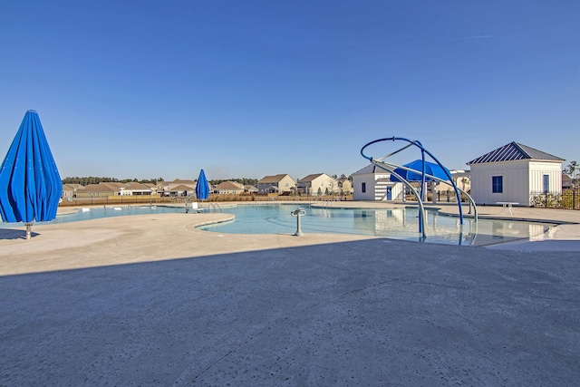 view of pool with a patio