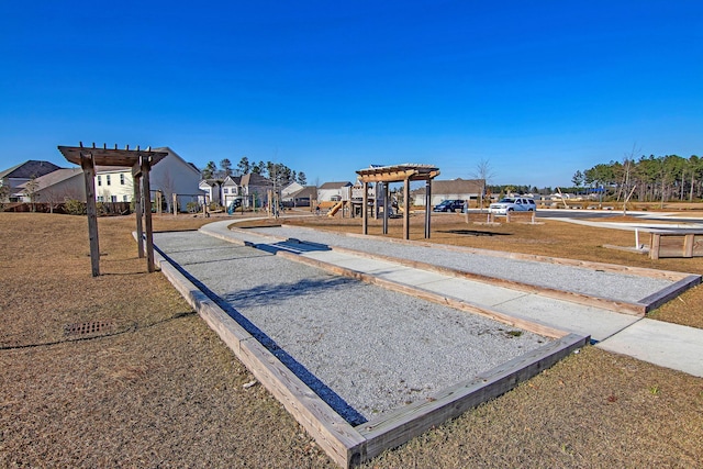 view of jungle gym featuring a pergola