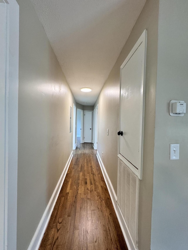 hall featuring dark hardwood / wood-style flooring