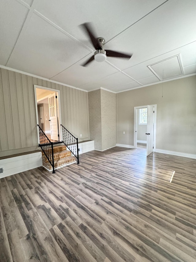 unfurnished room featuring crown molding, ceiling fan, and hardwood / wood-style floors