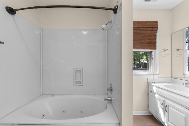 4162 Murrells Inlet Rd, Murrells Inlet, SC 29576 - bathroom featuring tile patterned floors, vanity, a combined bath / shower with jetted tub, and baseboards
