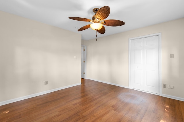 4162 Murrells Inlet Rd, Murrells Inlet, SC 29576 - unfurnished bedroom featuring baseboards, wood finished floors, and a ceiling fan