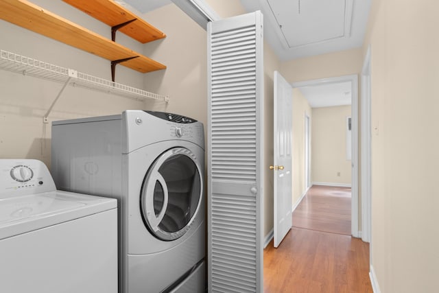 4162 Murrells Inlet Rd, Murrells Inlet, SC 29576 - washroom with independent washer and dryer, light wood-type flooring, baseboards, and attic access