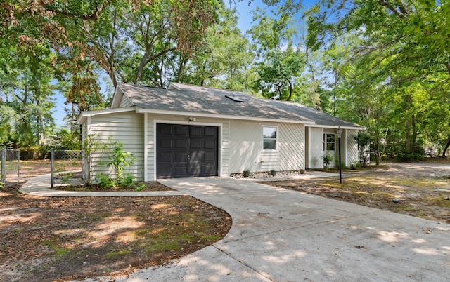 4162 Murrells Inlet Rd, Murrells Inlet, SC 29576 - view of front of home featuring driveway, an attached garage, and roof with shingles