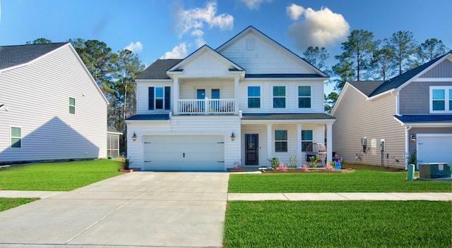 craftsman-style house featuring driveway, a balcony, a porch, and a front lawn