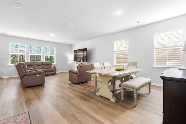 dining area featuring visible vents, recessed lighting, baseboards, and light wood-style floors