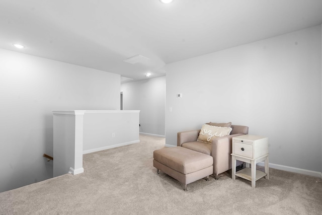 living area featuring an upstairs landing, recessed lighting, baseboards, and carpet floors