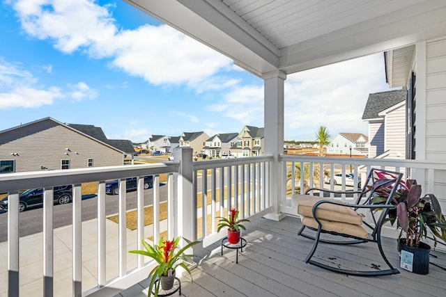 balcony featuring a residential view