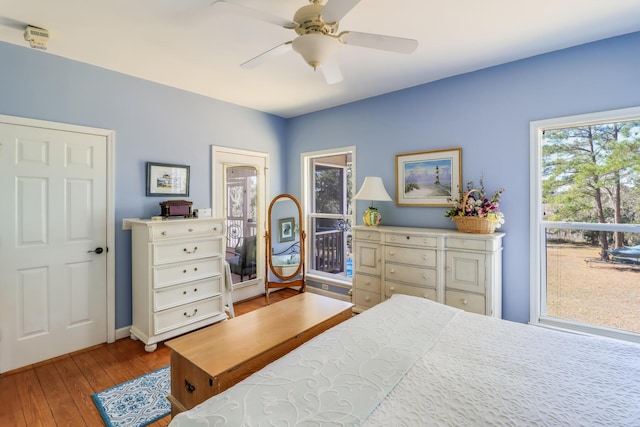 bedroom with light wood finished floors and ceiling fan