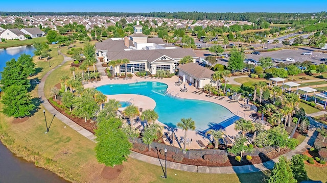 drone / aerial view with a water view