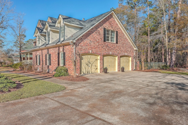 view of home's exterior with a garage