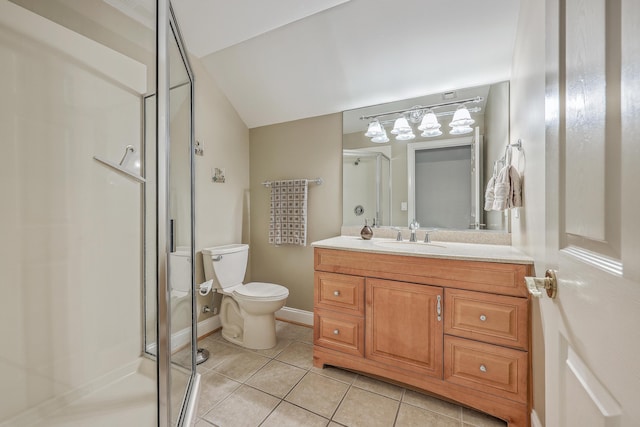 bathroom featuring tile patterned flooring, vanity, toilet, and an enclosed shower