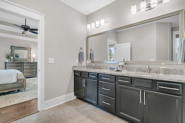 bathroom with vanity, plenty of natural light, and ceiling fan