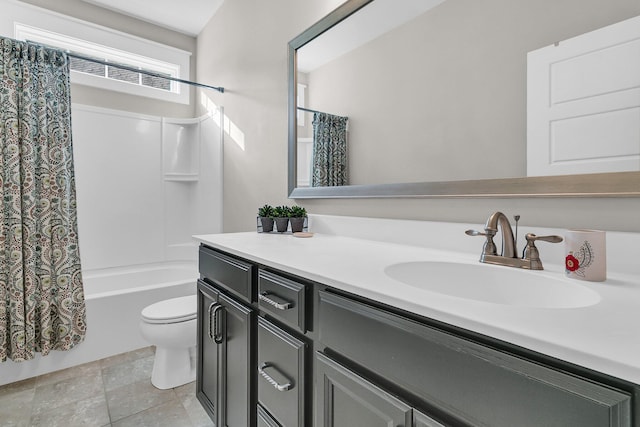 full bathroom featuring vanity, shower / tub combo, and toilet