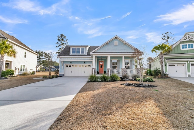 craftsman inspired home with a porch and a garage