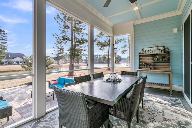 sunroom / solarium featuring coffered ceiling, a wealth of natural light, and ceiling fan