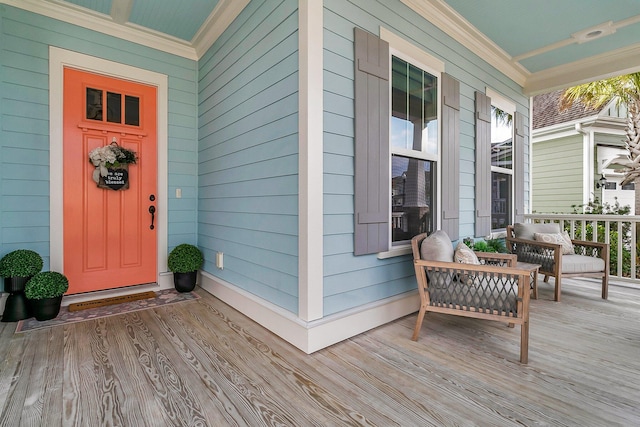 entrance to property featuring a porch