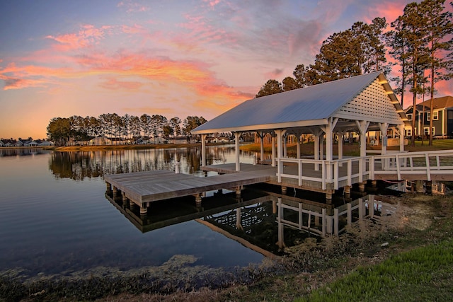 dock area with a water view