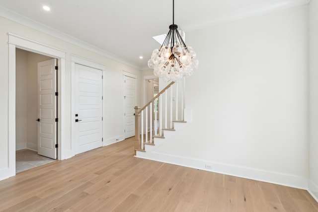 2790 Burden Creek Rd, Johns Island, SC 29455 - foyer with a chandelier, baseboards, light wood-type flooring, stairs, and recessed lighting