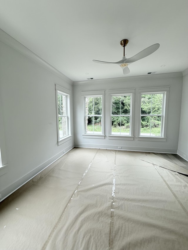 2790 Burden Creek Rd, Johns Island, SC 29455 - unfurnished room with baseboards, a ceiling fan, and ornamental molding
