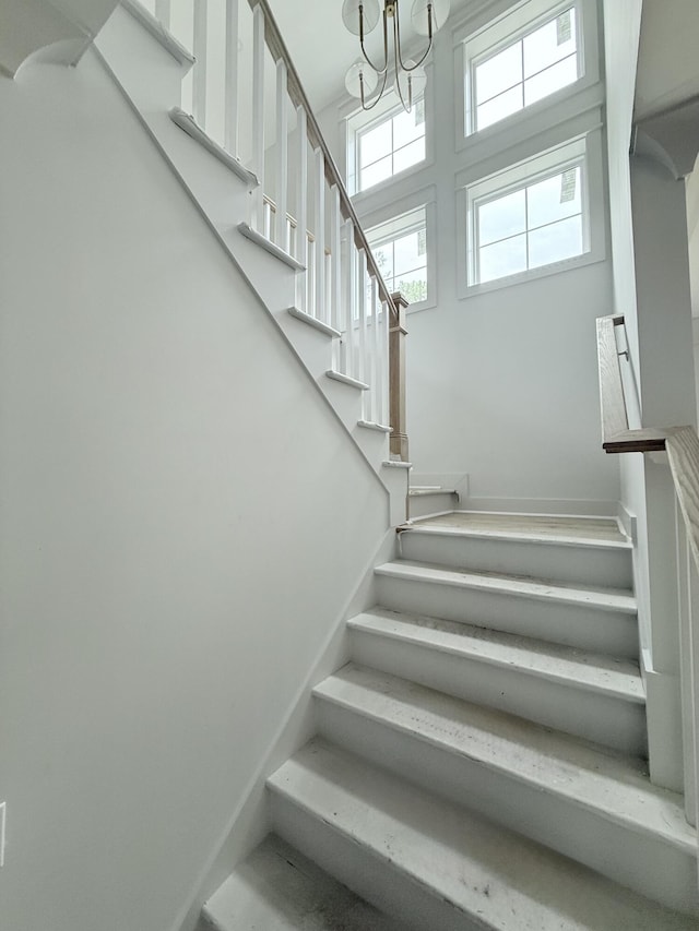 2790 Burden Creek Rd, Johns Island, SC 29455 - stairway featuring a chandelier