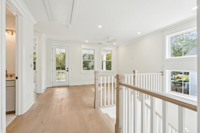 2790 Burden Creek Rd, Johns Island, SC 29455 - hallway with attic access, an upstairs landing, light wood finished floors, ornamental molding, and recessed lighting