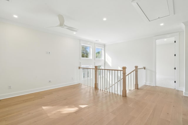 2790 Burden Creek Rd, Johns Island, SC 29455 - empty room featuring attic access, light wood-style floors, recessed lighting, baseboards, and crown molding