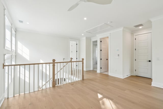 2790 Burden Creek Rd, Johns Island, SC 29455 - unfurnished room featuring attic access, ornamental molding, light wood-style flooring, recessed lighting, and baseboards